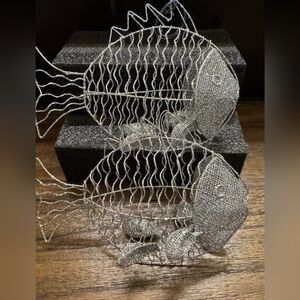 A Set Of Two Silver Glitter Wireframe Fish Ornaments